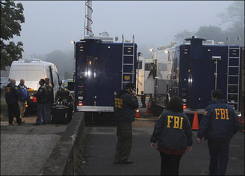 FBI personnel at operations center. 