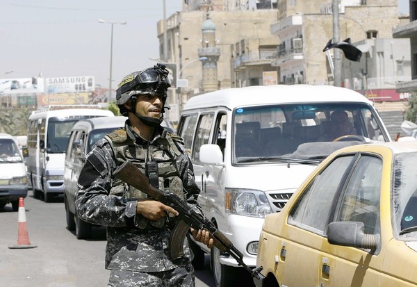 Iraqi soldier mans a checkpoint
