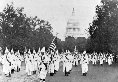 The KKK marching down Pennsylvania Avenue in Washington in 1925.